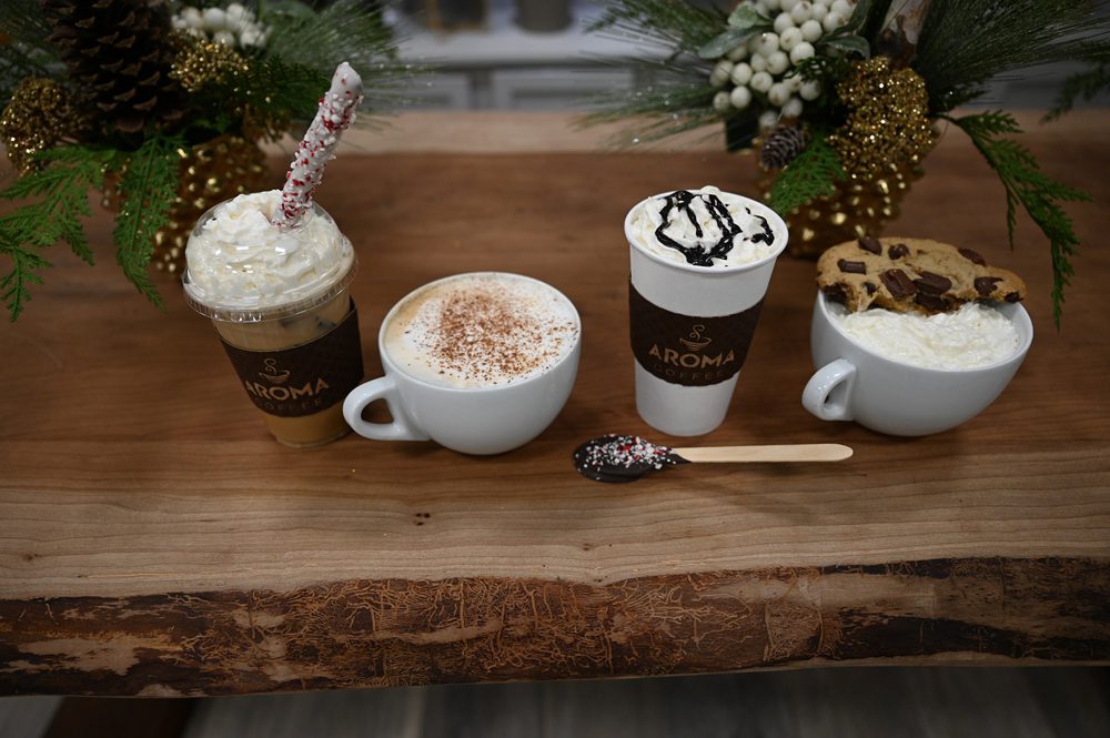 aroma coffees lined-up on a wooden table aroma coffees lined-up on a wooden table