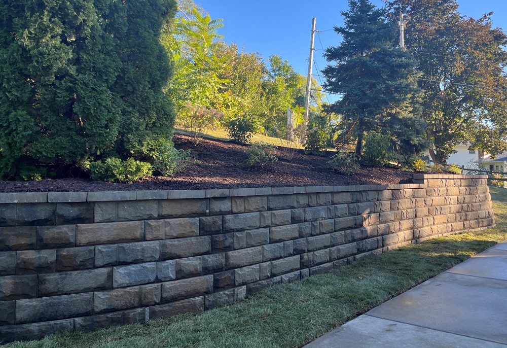 Block wall incorporated into an existing garden landscape Block wall incorporated into an existing garden landscape