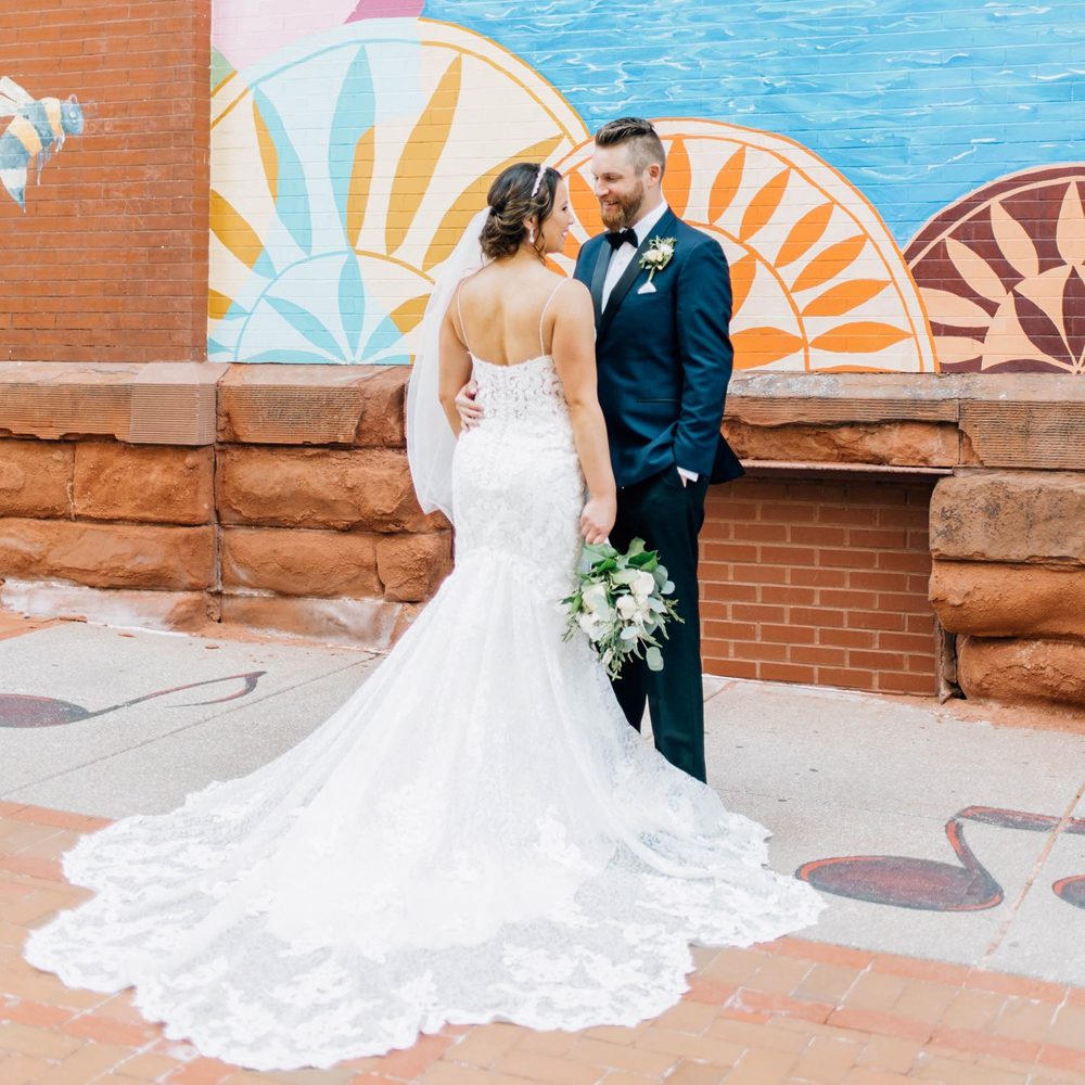 bride and groom looking at each other