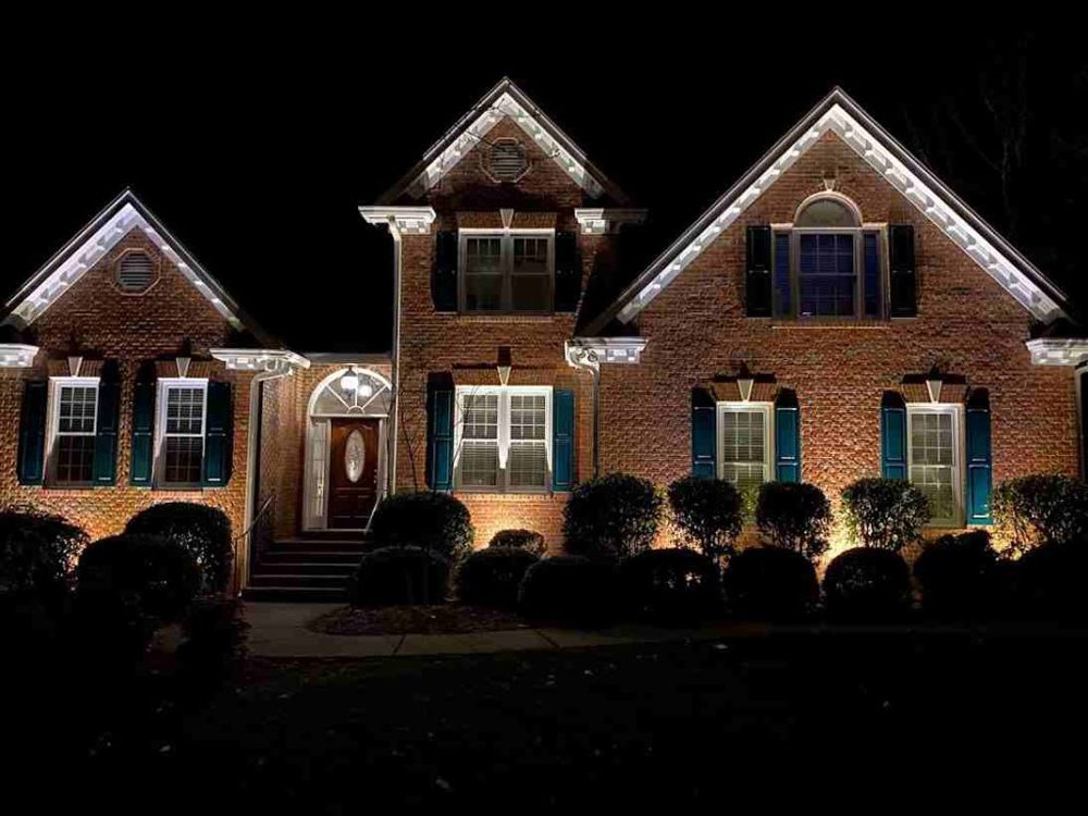 overview of a house with landscape lighting overview of a house with landscape lighting