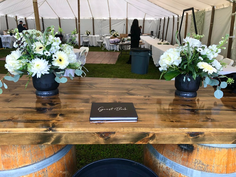 guest book placed on a wooden table