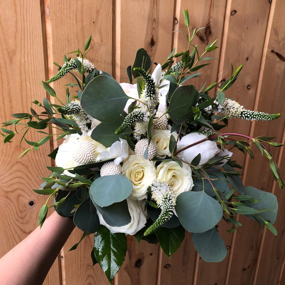 bouquet of white flowers and buds