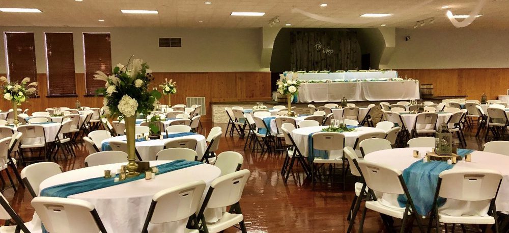 white tables and chairs for a special occasion