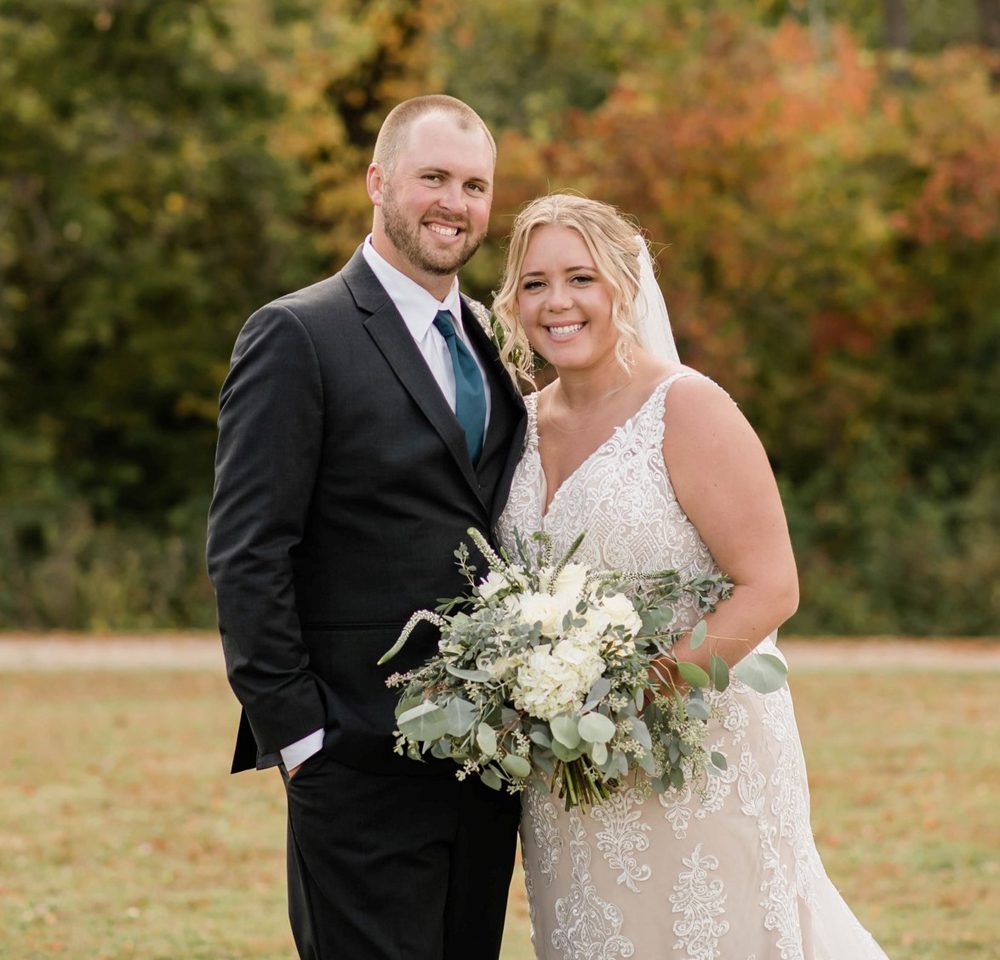 bride and groom smiling